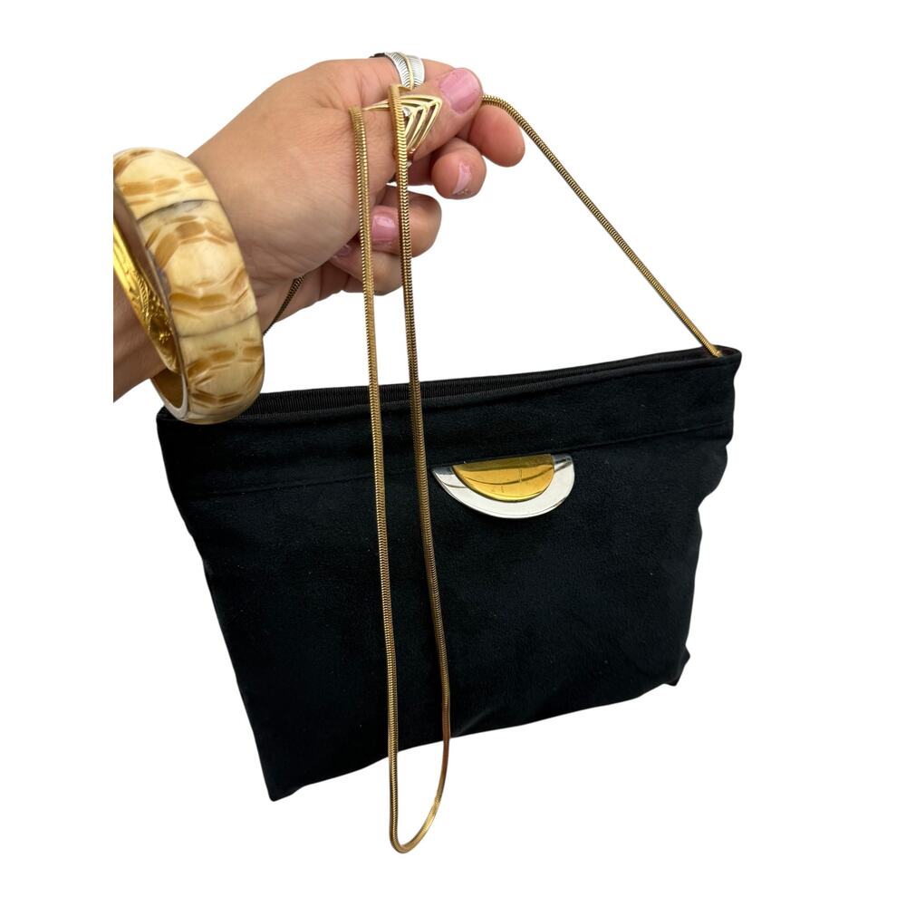 1970's REVA ULTRA SUEDE black purse with metal sun moon detail